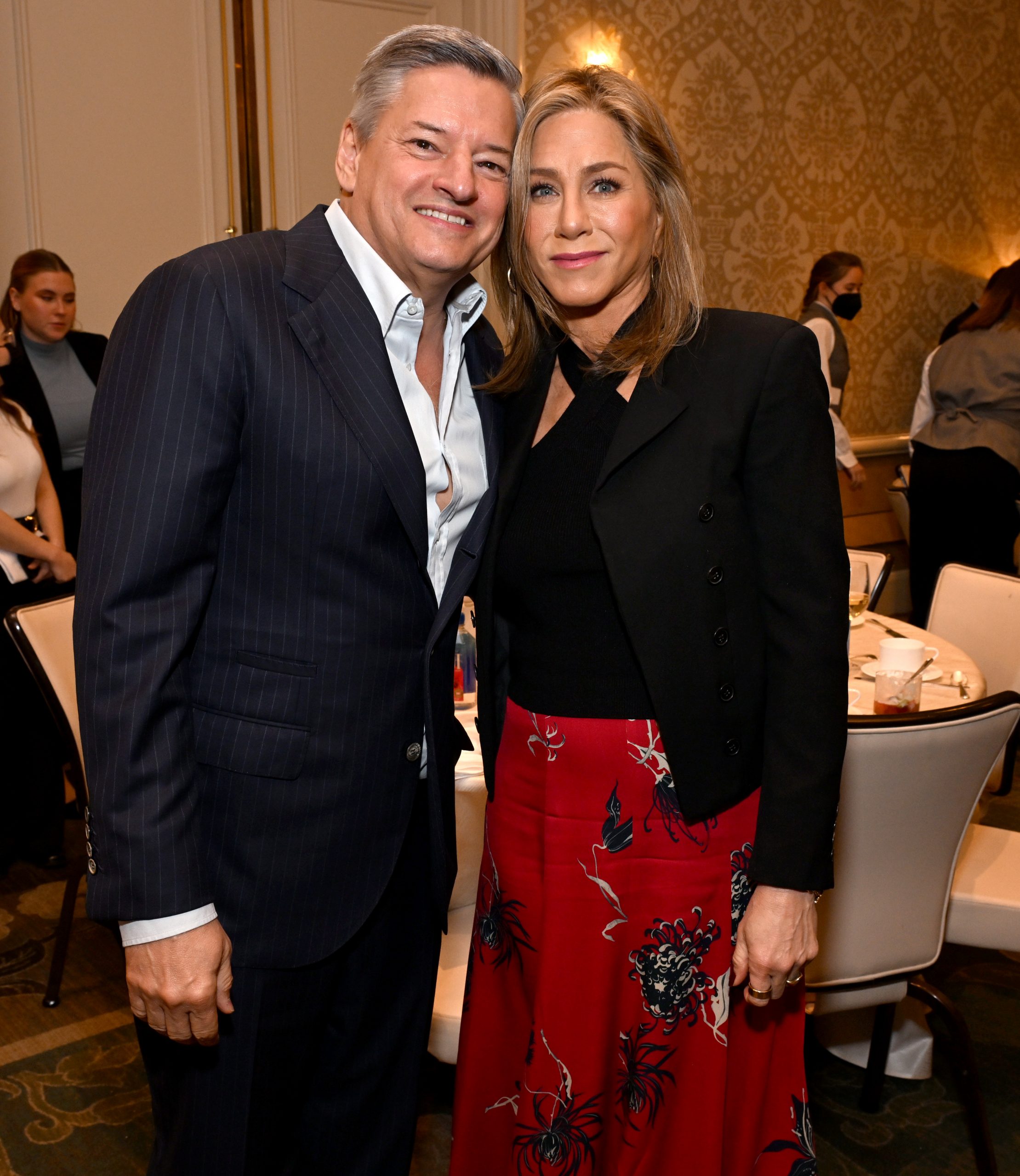 Ted Sarandos and Jennifer Aniston at an awards ceremony last year. The actress starred in Friends, which has been shown on Netflix